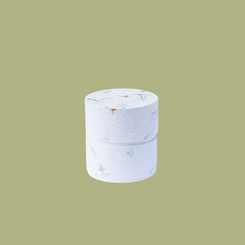 Cilindervormige mini urn, sterbloemblaadjes